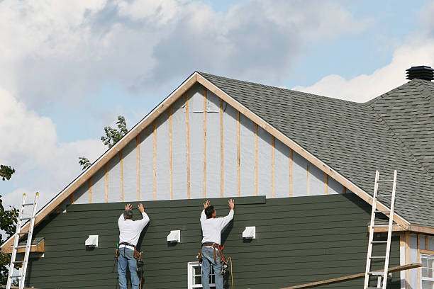 Professional Siding technician working in Bethesda, MD